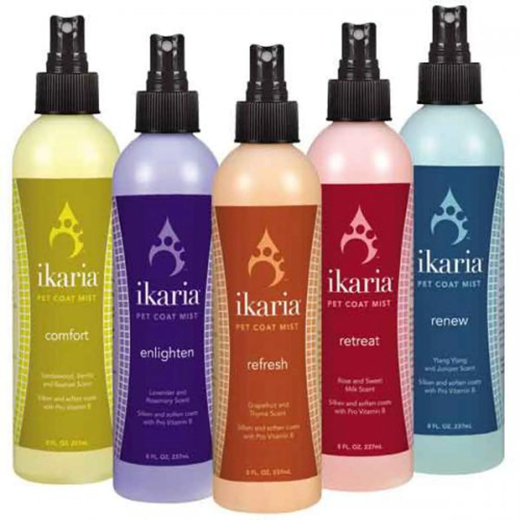 Five bottles of ikaria pet coat mist in different colors with labels.